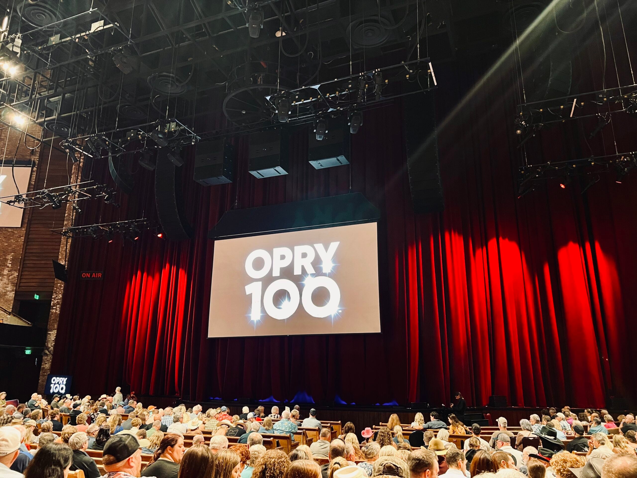 Audience inside the Grand Ole Opry House in Nashville before an Opry 100 performance