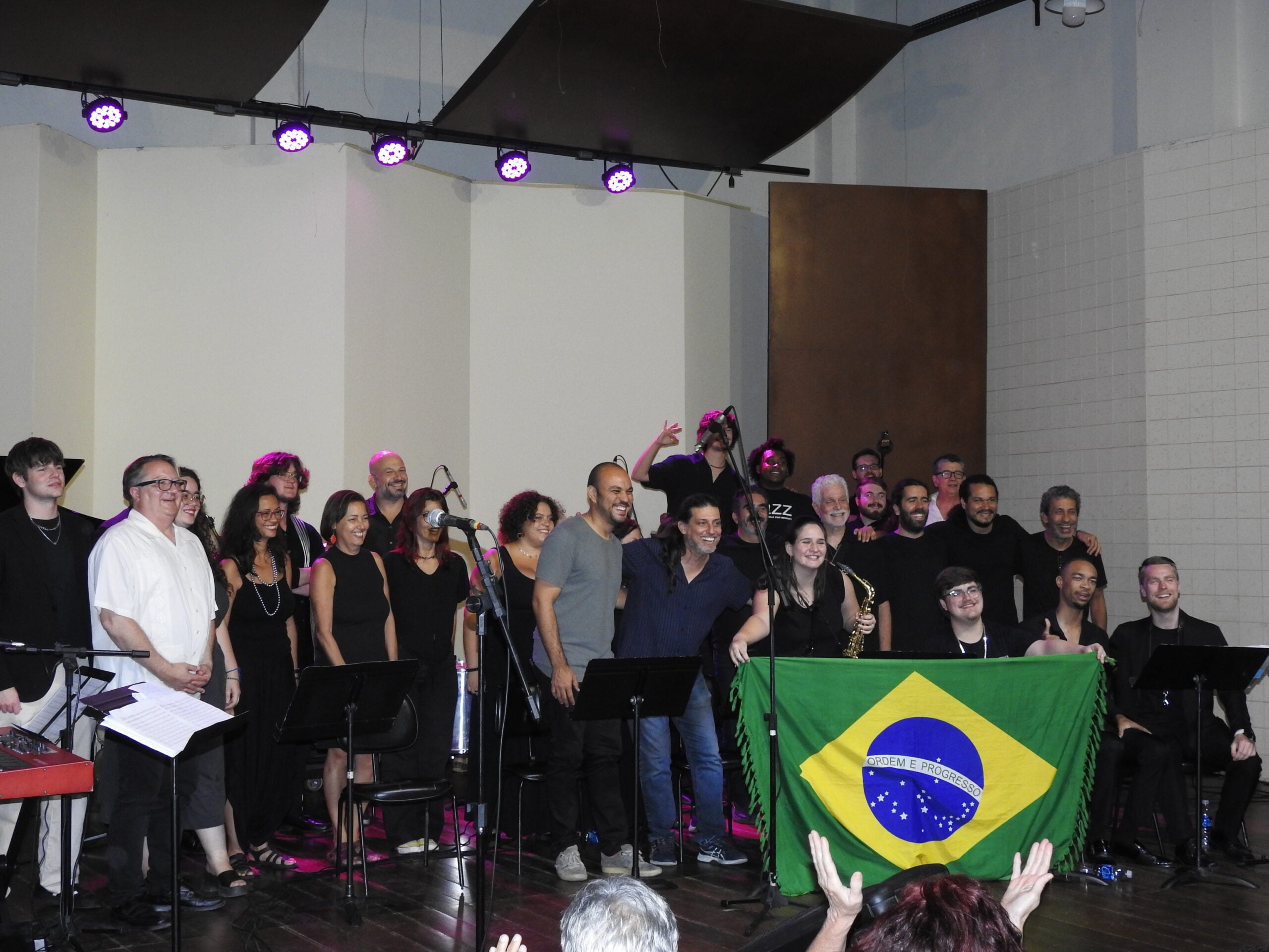 Visiting student ensemble with Brazilian musicians after a collaborative performance in Rio de Janeiro