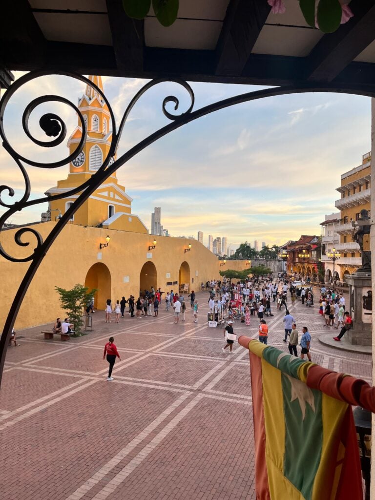 Cartagena Clock Tower plaza and evening crowds at sunset
