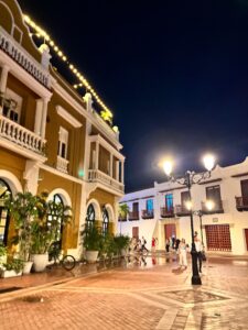 Illuminated colonial buildings and balconies in Cartagena's walled city at night