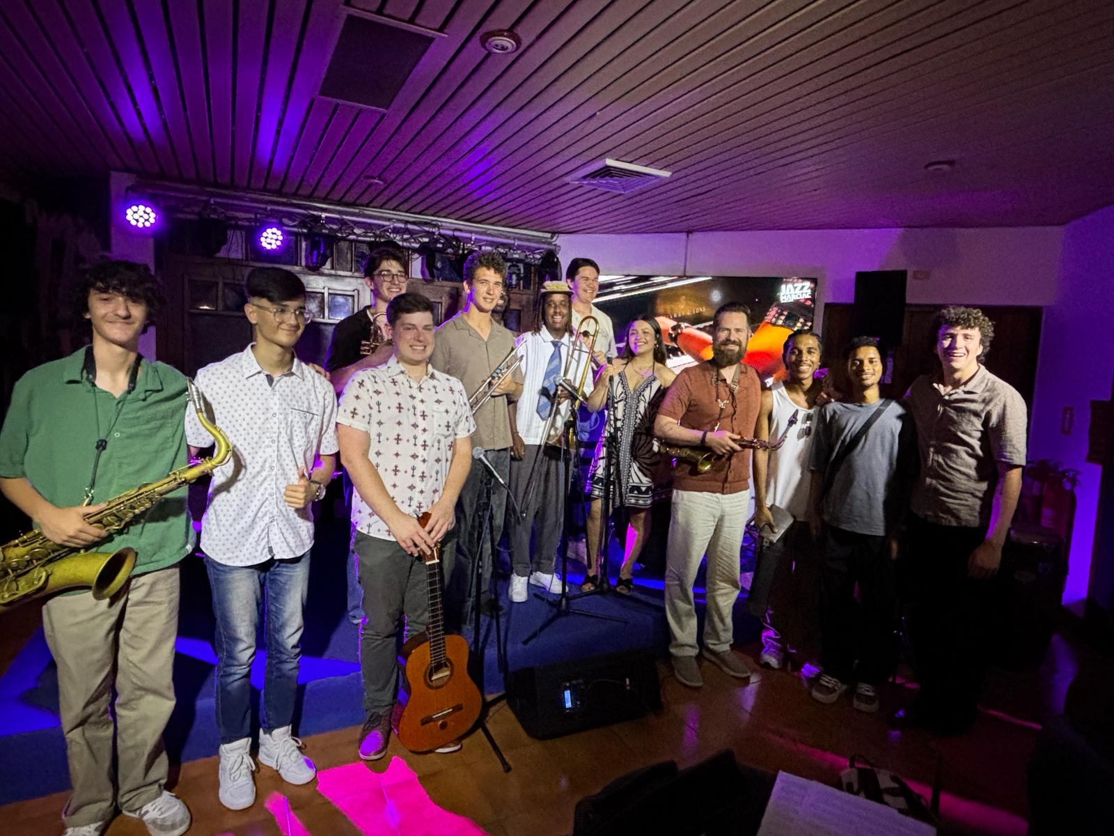 Teenage Latin jazz musicians with Cuban musicians after performing together in Havana