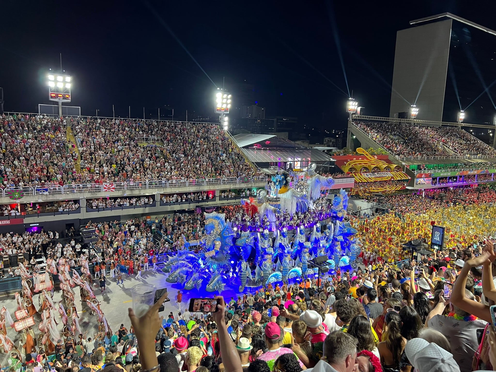Samba school parade and spectators at the Sambadrome during Rio Carnival