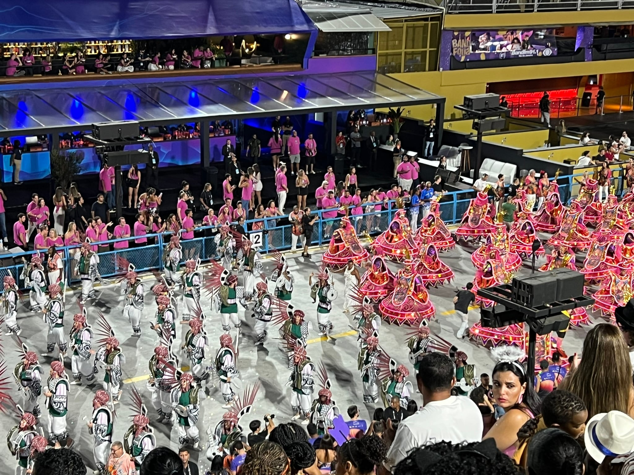 Samba school performers moving through the Sambadrome during Rio Carnival